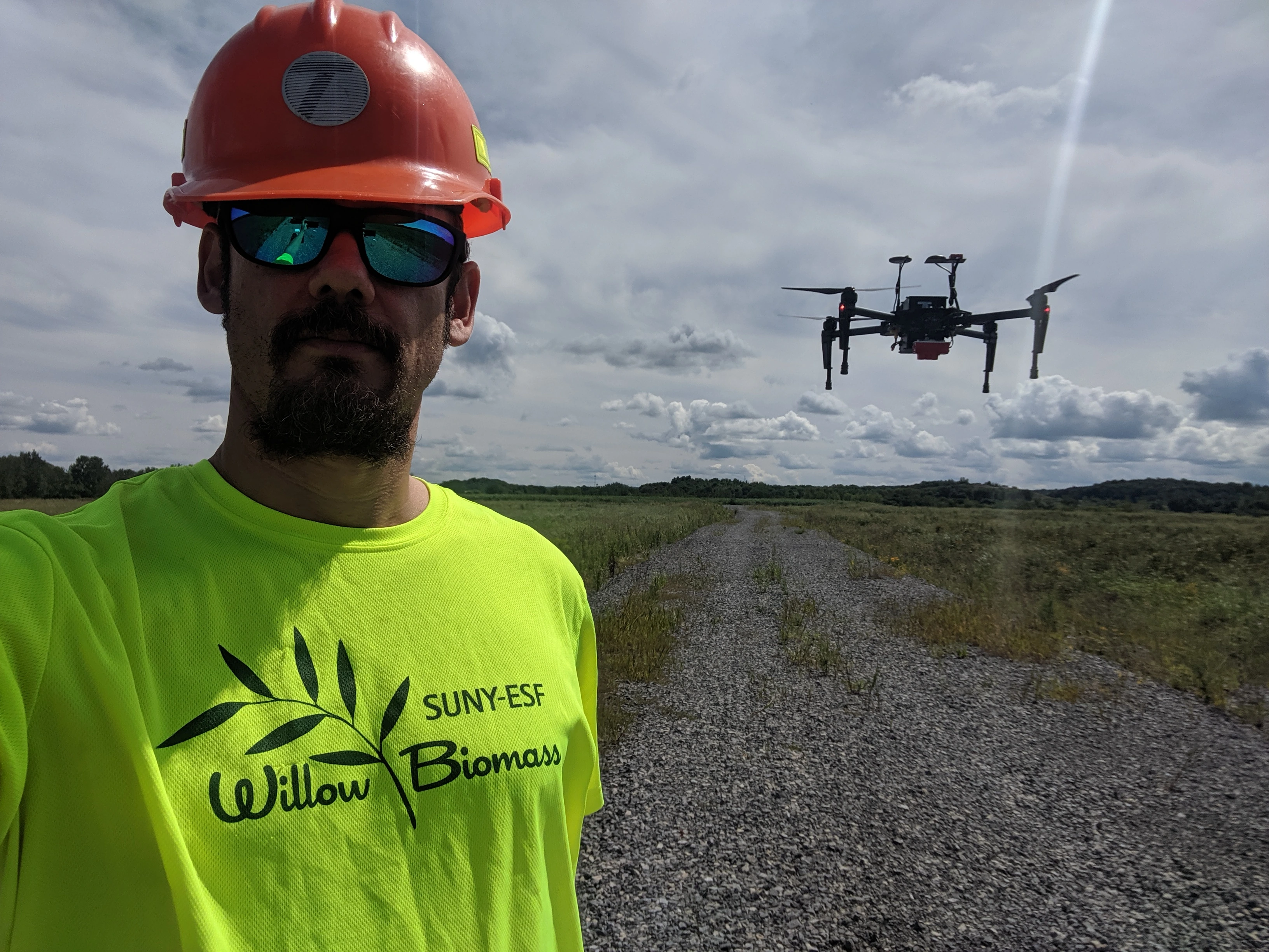 Justin Heavey with a drone during field work, 2019