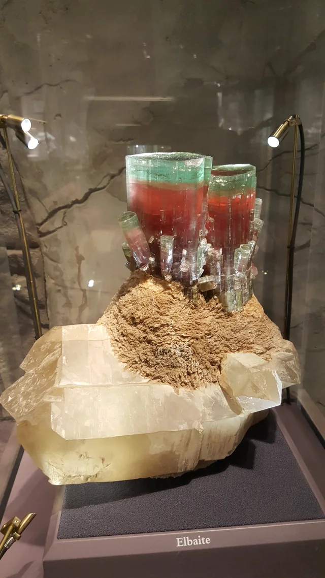 Elbaite specimen photographed in a museum display